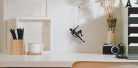 Glossy Black Wall Sculpture Climbing 15" Man